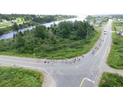 Tor Bay Acadien Society - 2016 Festival Savalette: Tintamarre marchers heading dwn “la butte du pungue (pont)”